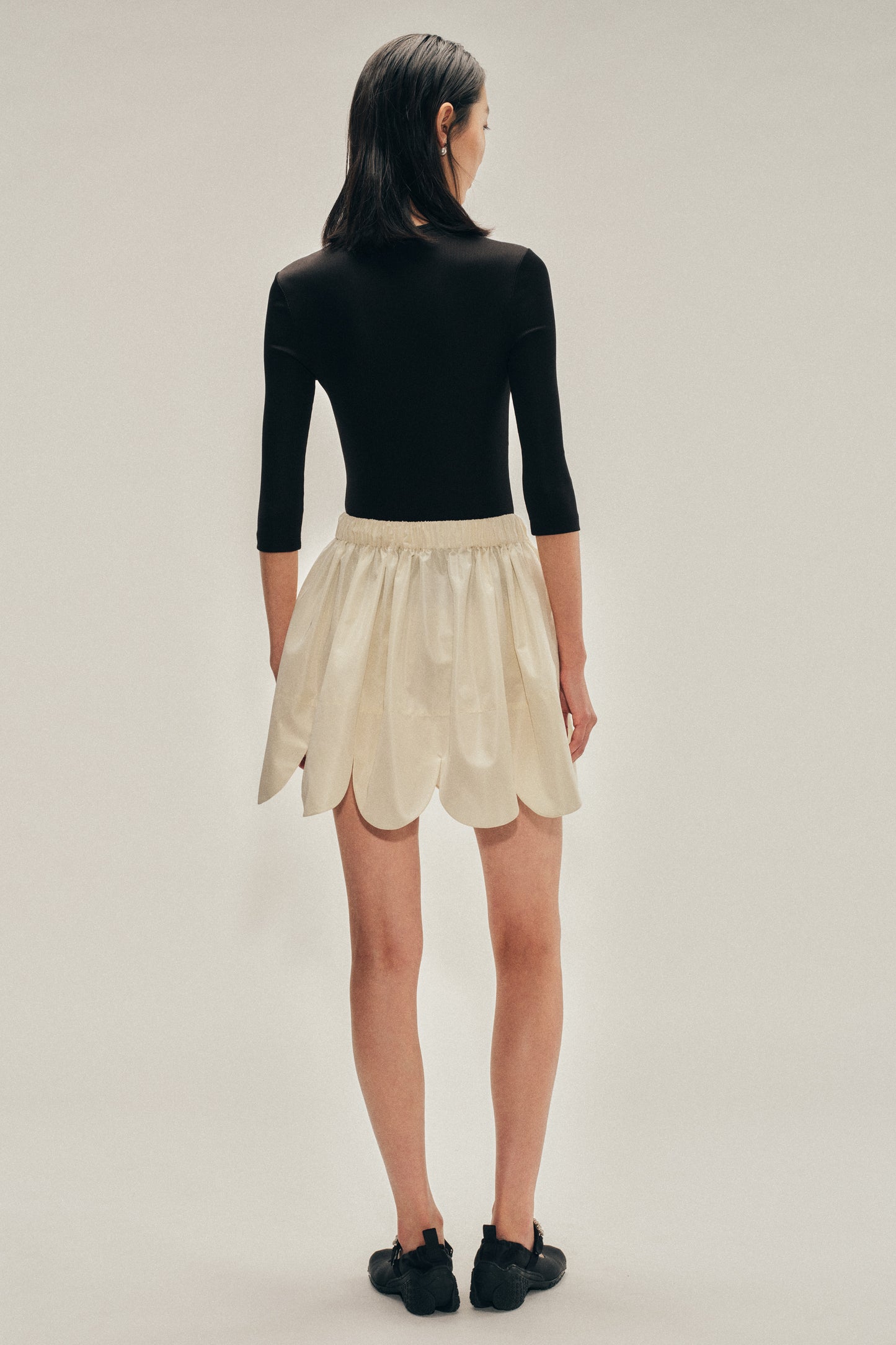 Petal Hem Mini Skirt