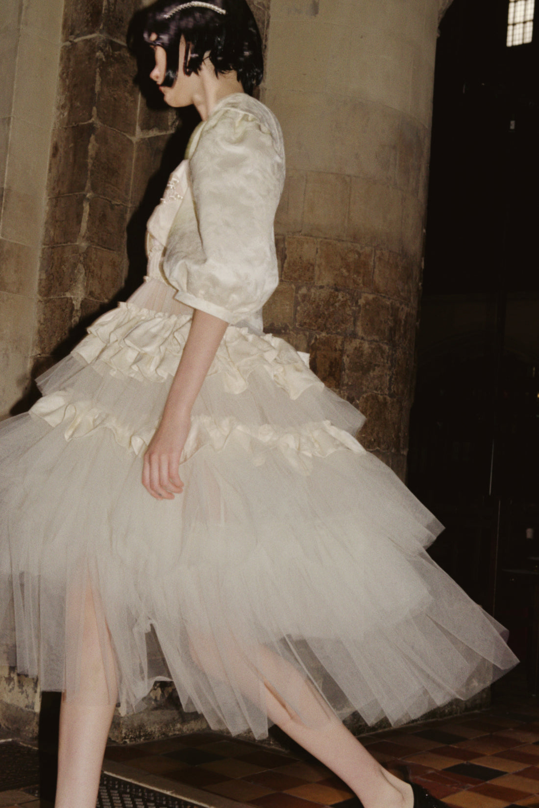 simone rocha dress Ruched Floral Detailed In Rose Antidote Fashion and Lifestyle Simone Rochas signature slip dress receives an update with an exaggerated frill detail at the bust Translucent Layers at Simone Rocha